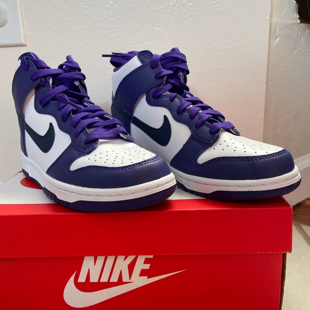 Never worn Nike dunk high top in varsity purple